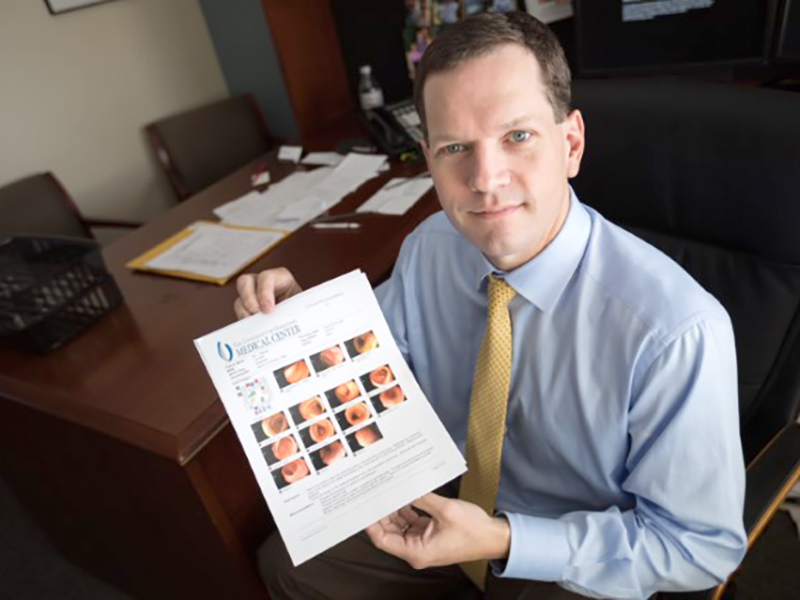Dr. Shannon Orr, who leads the UMMC Cancer Institute team that treats colon cancer had his colonoscopy early based on a family history of the disease. He shows results here, including photos of a few polyps before they were removed.
